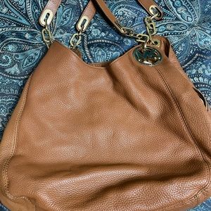 MK TAN IN COLOR IN EXCELLENT  CLEAN CONDITION